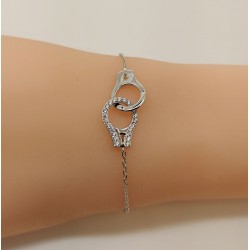 Bracelet argent 925 rhodié menotte serti d'oxyde de zirconium